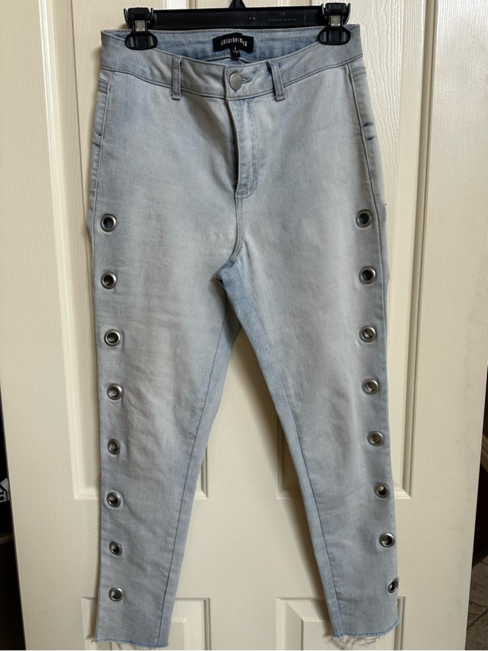 Fashion Nova Light Blue Skinny Jeans with Silver Eyelets